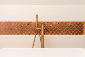 Gouden kraan met L'Antic Colonial mozaïek